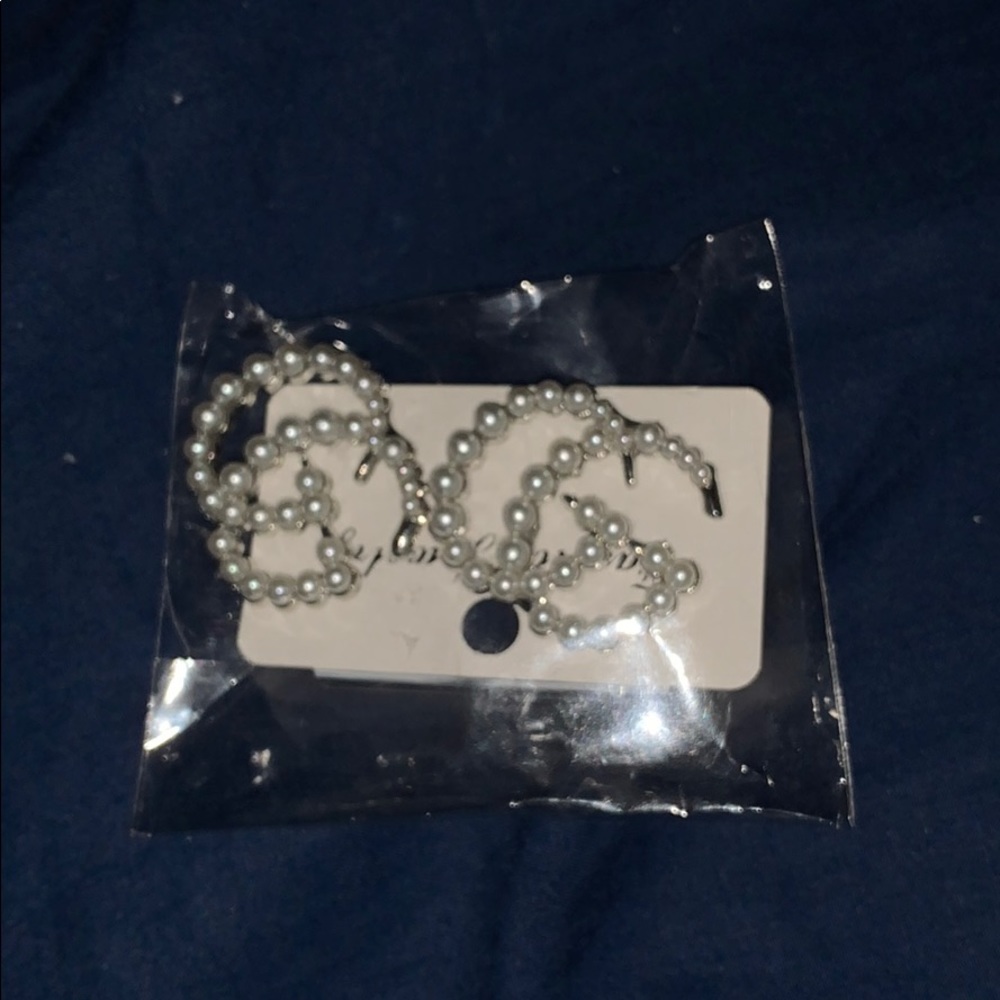 Another beautiful but different pair of earrings